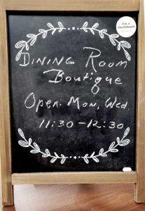 Dining room boutique sign
